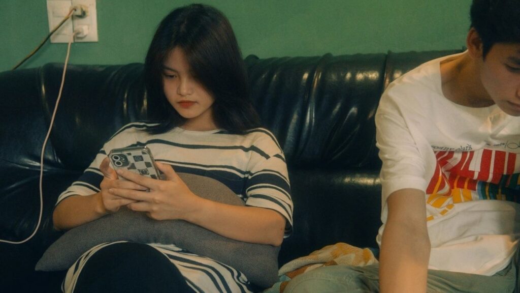 Teenager Addicted to Phone